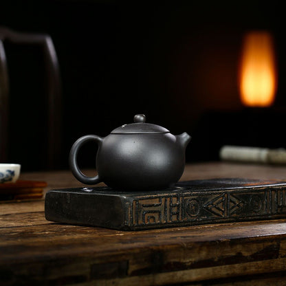 Yixing Plum Blossom Black Clay Xi Shi Teapot