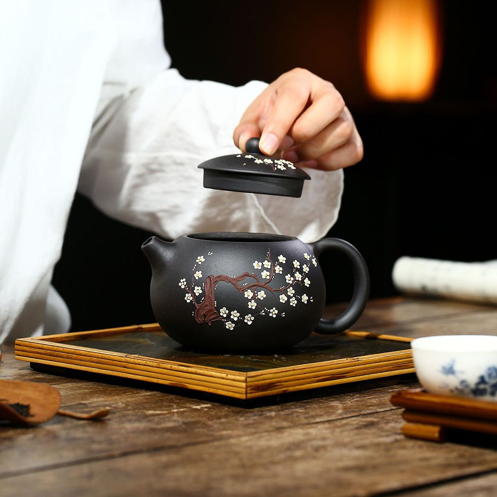 Yixing Plum Blossom Black Clay Xi Shi Teapot